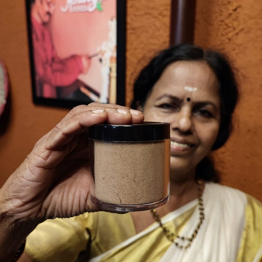 Radha Ma'am holding Suvarna Facepack